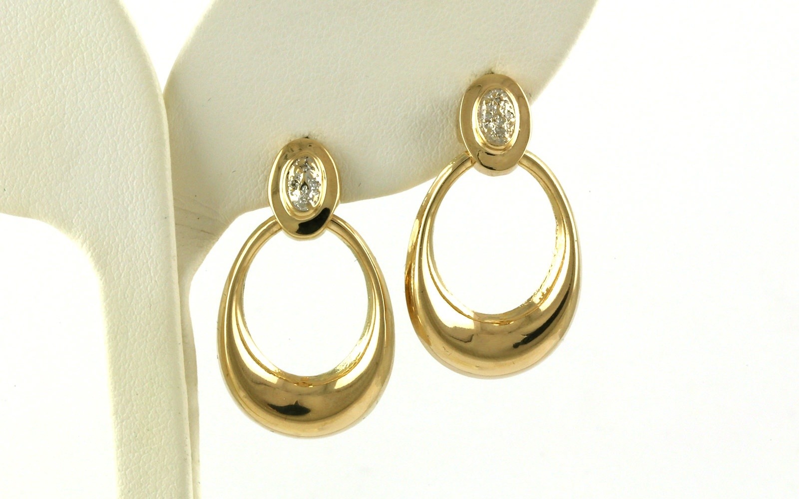 Estate Piece: Oval Door Knocker Hoop Earrings in Yellow Gold (0.06cts TWT)