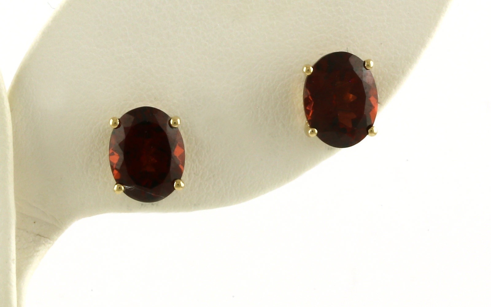 Estate Piece: Oval Garnet Stud Earrings in Yellow Gold