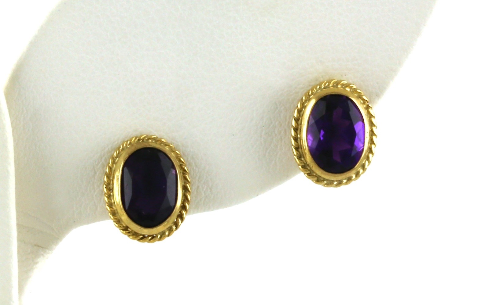 Bezel-set Oval Amethyst Stud Earrings with Rope Edge Detail in Yellow Gold