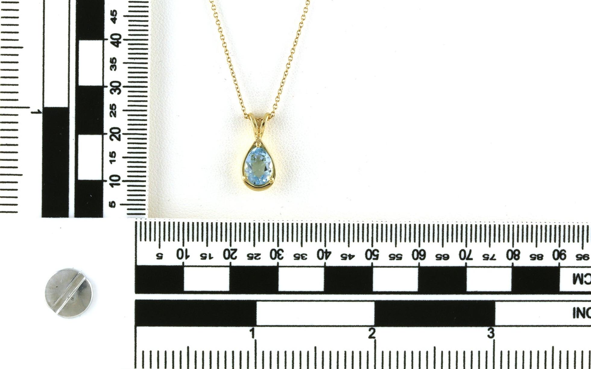 Estate Piece: Solitaire Pear-cut Aquamarine Necklace with Rabbit Ear Bail in Yellow Gold (1.50cts) scale