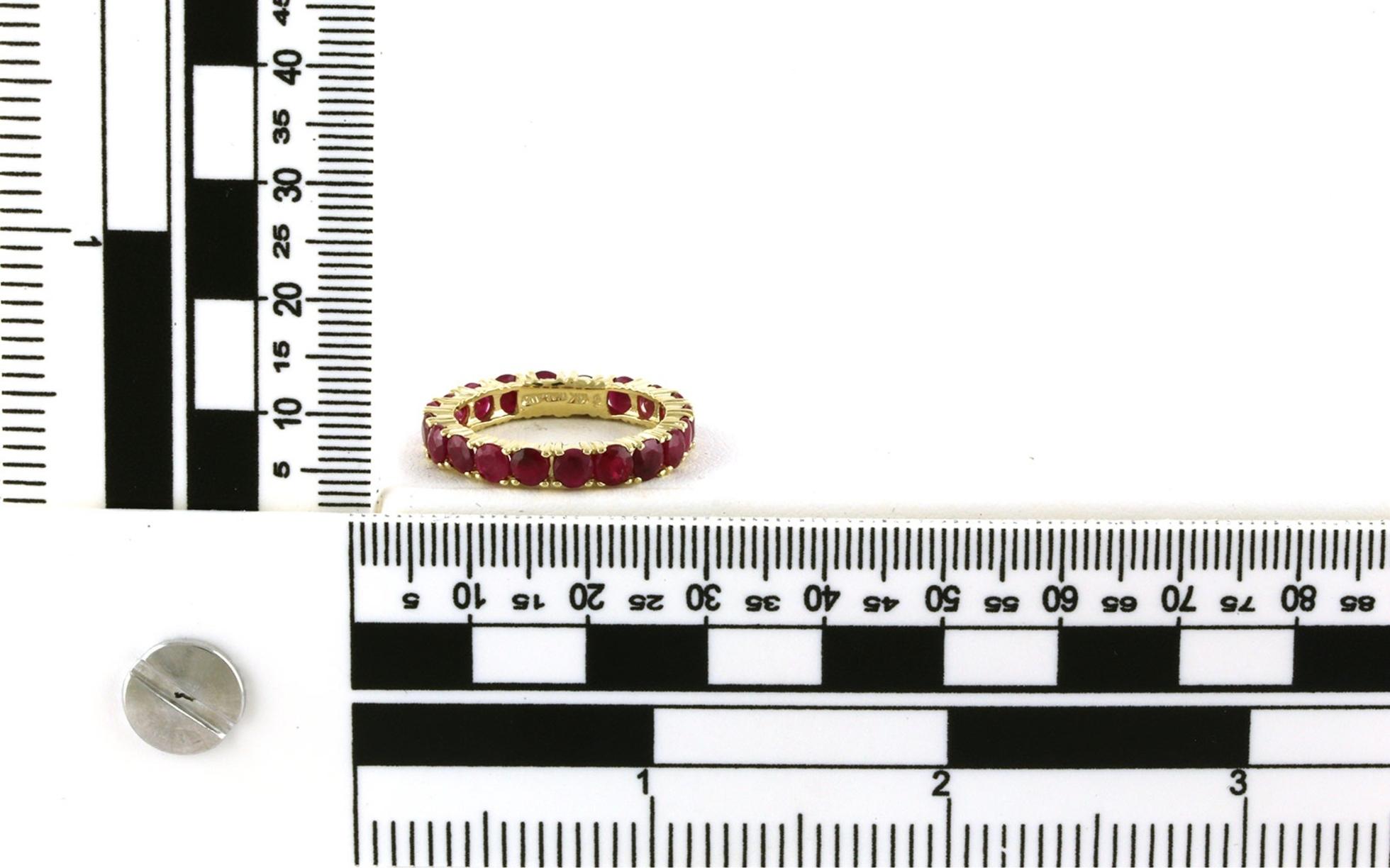 Estate Piece: Share-prong Ruby Eternity Band in Yellow Gold (3.00cts TWT) scale