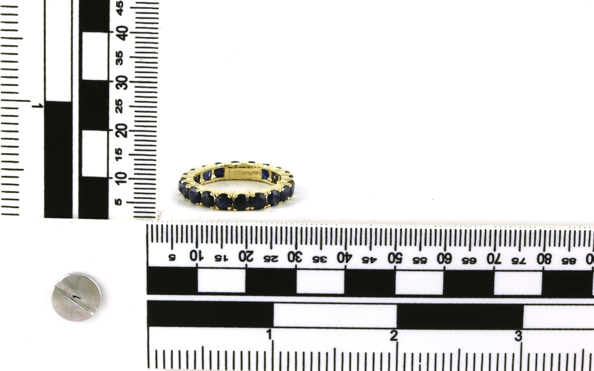 Estate Piece: Prong-set Sapphire Eternity Band in Yellow Gold (3.00cts TWT) scale