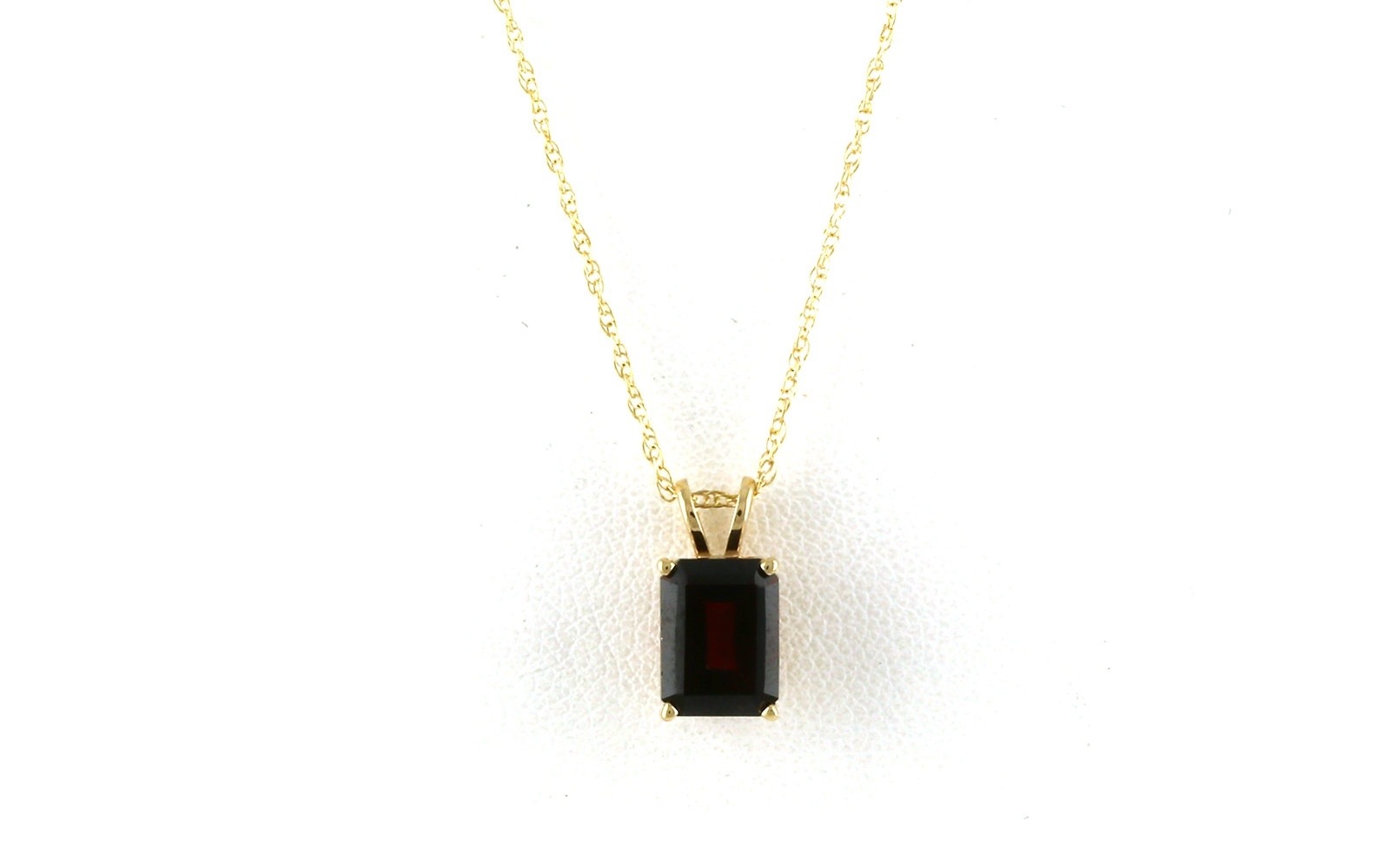 Estate Piece: Solitaire-style Emerald-cut Garnet Necklace in Yellow Gold