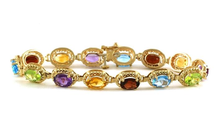 content/products/Estate Piece: Rainbow Amethyst, Peridot, Citrine, Blue Topaz, and Garnet Line Bracelet in Yellow Gold