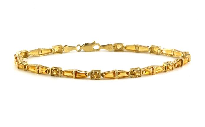 content/products/Estate Piece: Alternating Tapered Baguette and Round Citrine Line Bracelet in Yellow Gold