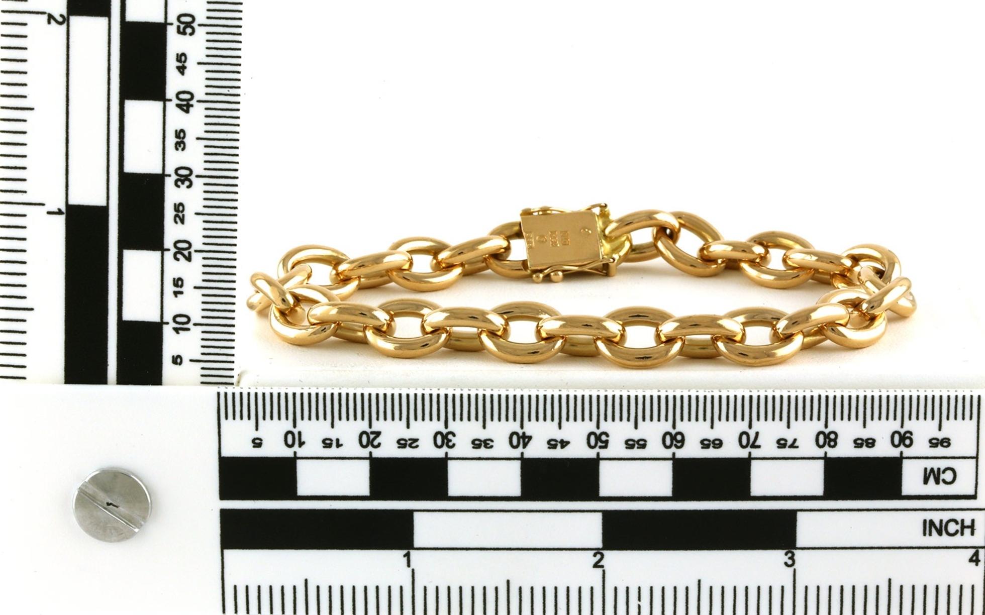 Estate Piece: Solid Oval Cable Link Bracelet in Yellow Gold scale