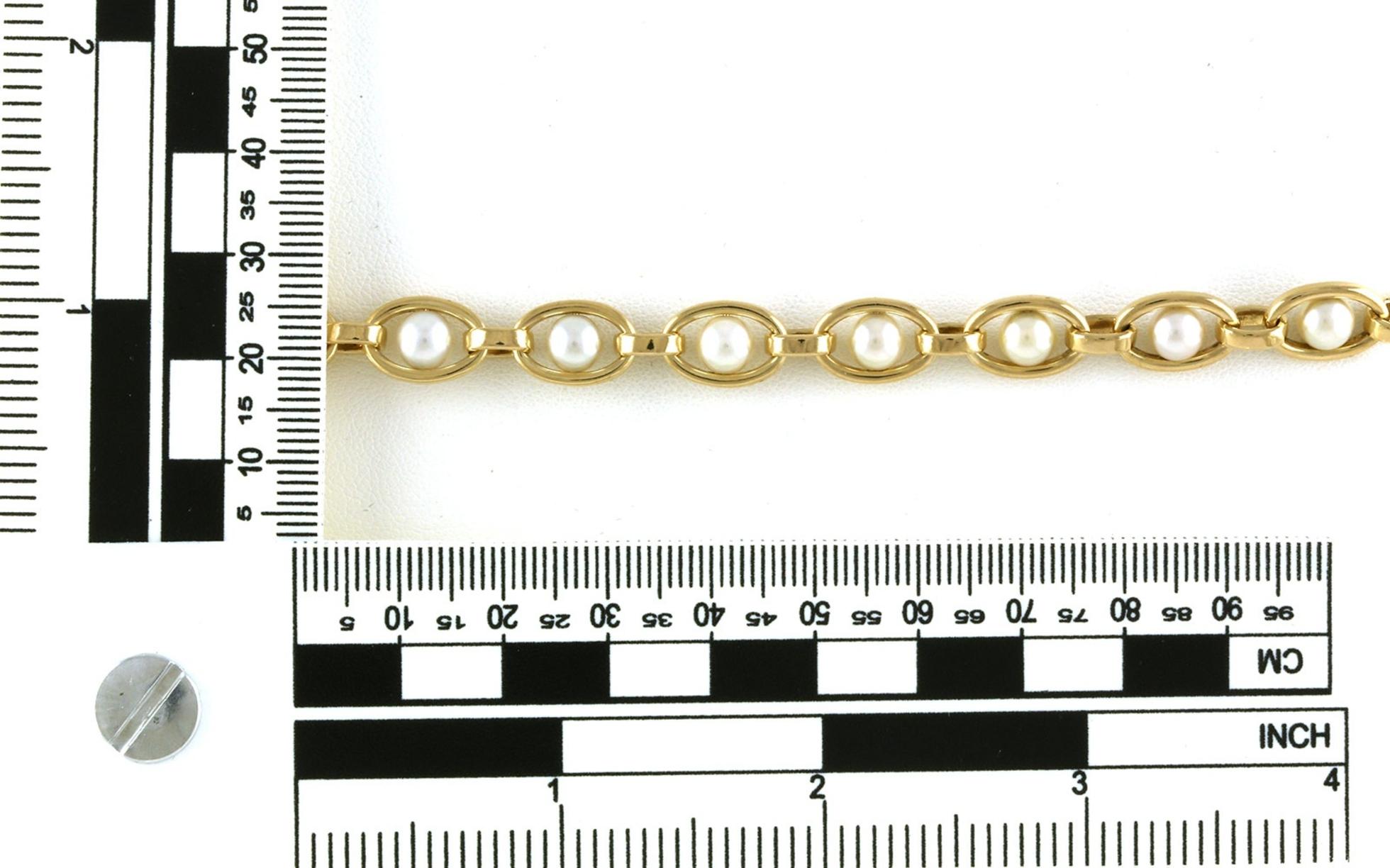 Estate Piece: Oval link Pearl Line Bracelet in Yellow Gold scale