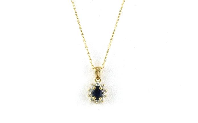 content/products/Estate Piece: Halo-style Oval-cut Sapphire and Diamon Necklace in Two-tone Yellow Gold with Rhodium Plating (0.60cts TWT)