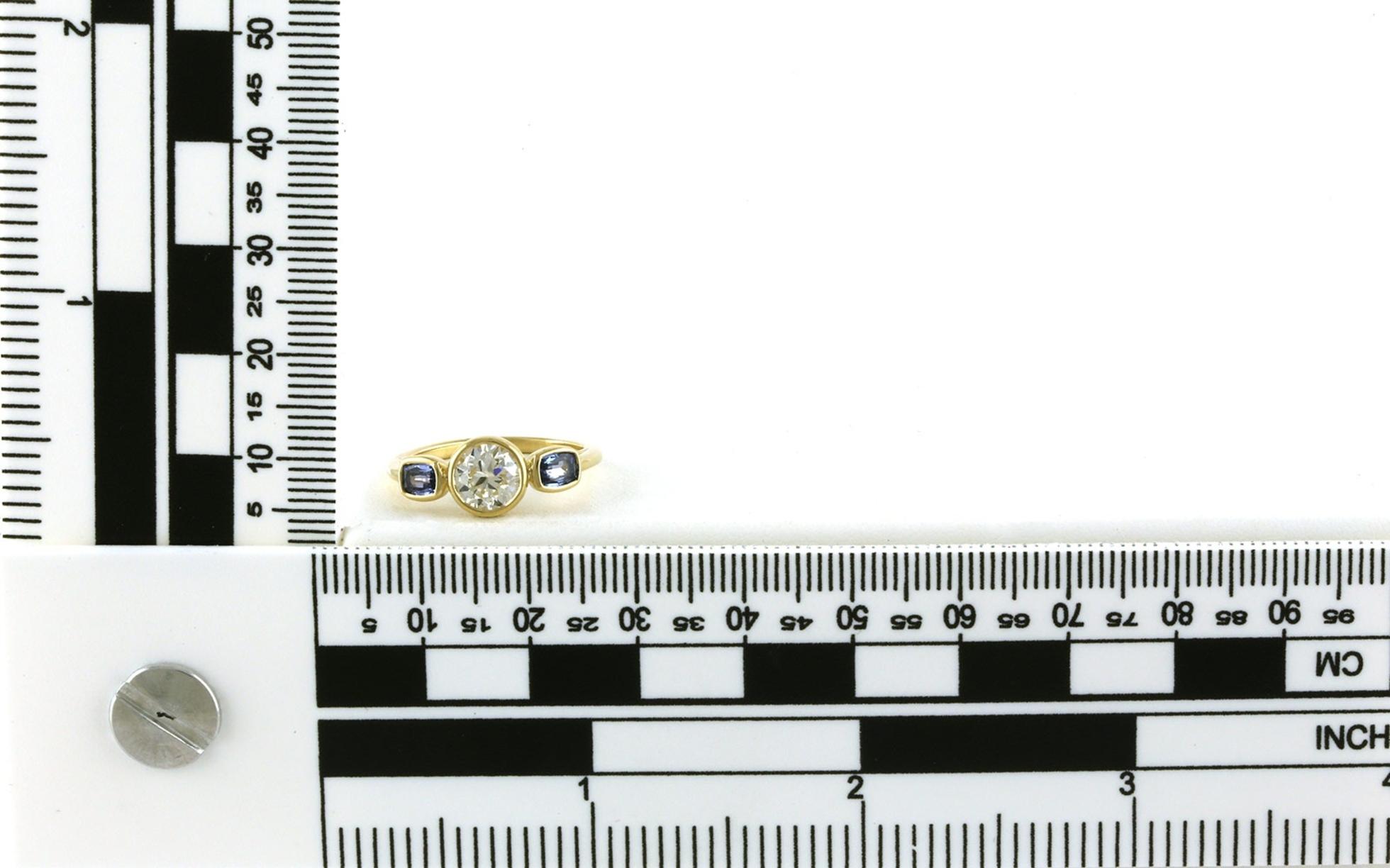 Bezel-set 3-stone Diamond and cushion-cut Montana Yogo Sapphire ring in yellow gold (1.52cts TWT) scale