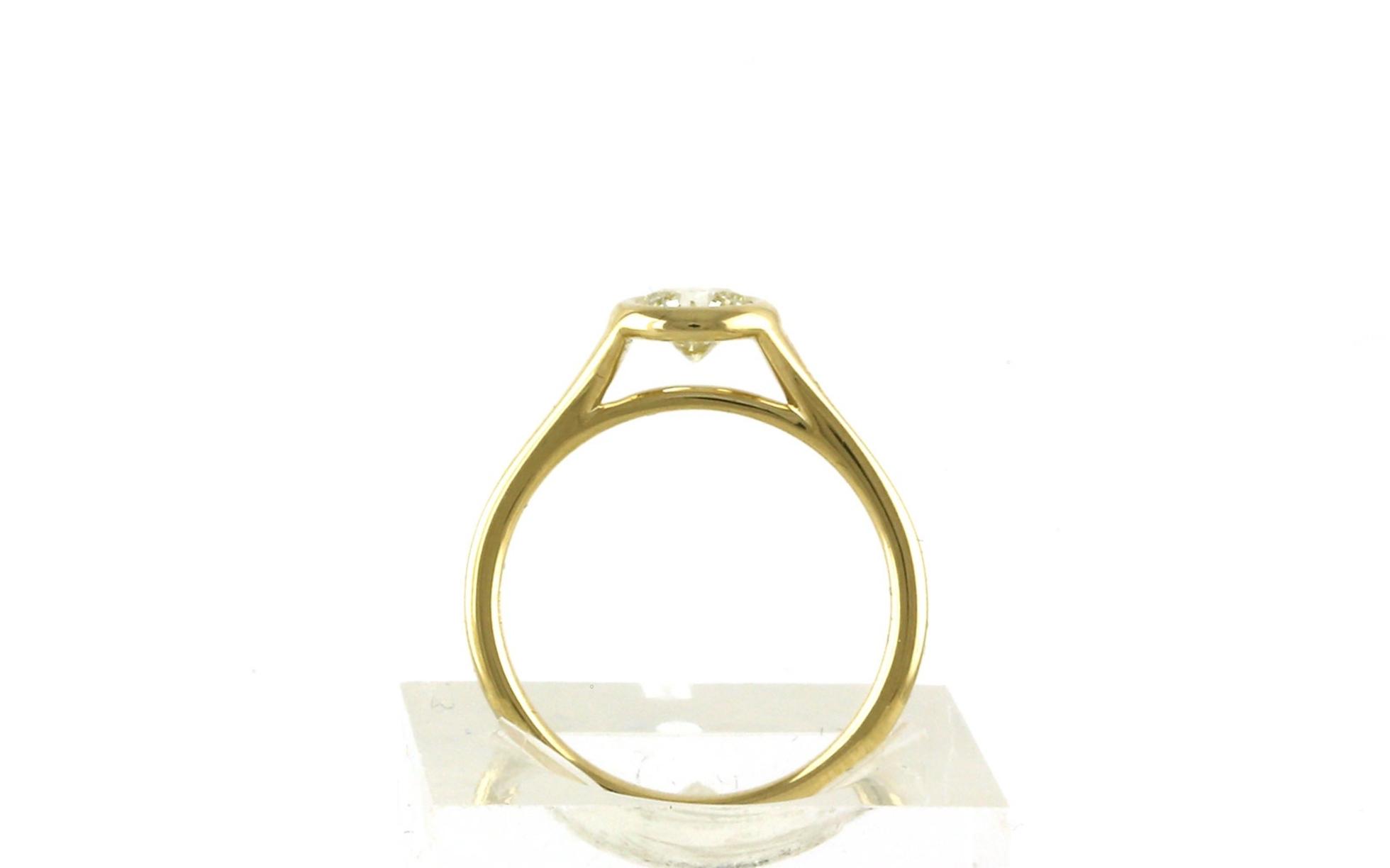 Bezel-Set Solitaire Diamond Engagement Ring in Yellow Gold (0.56cts) side