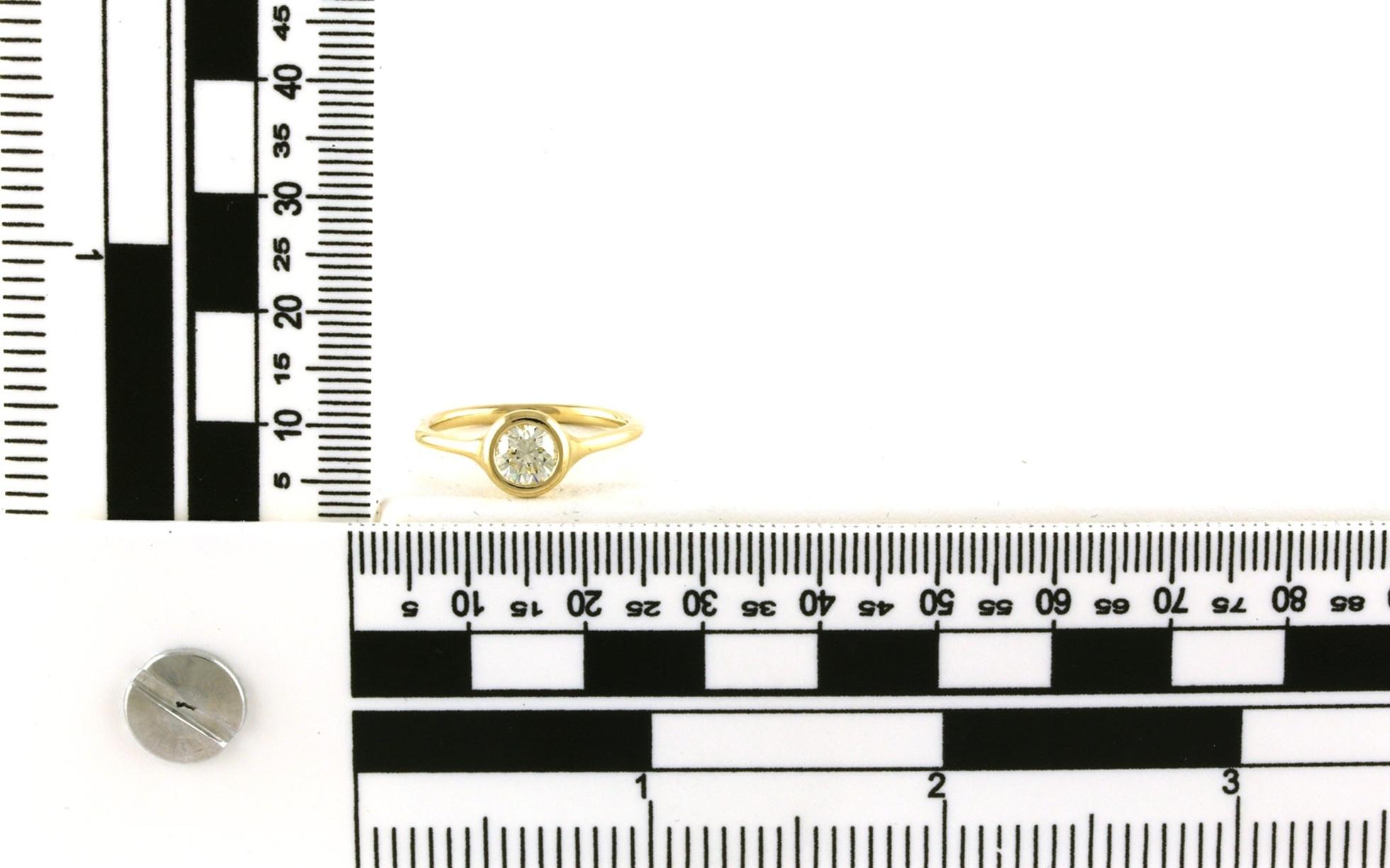 Bezel-Set Solitaire Diamond Engagement Ring in Yellow Gold (0.56cts) scale