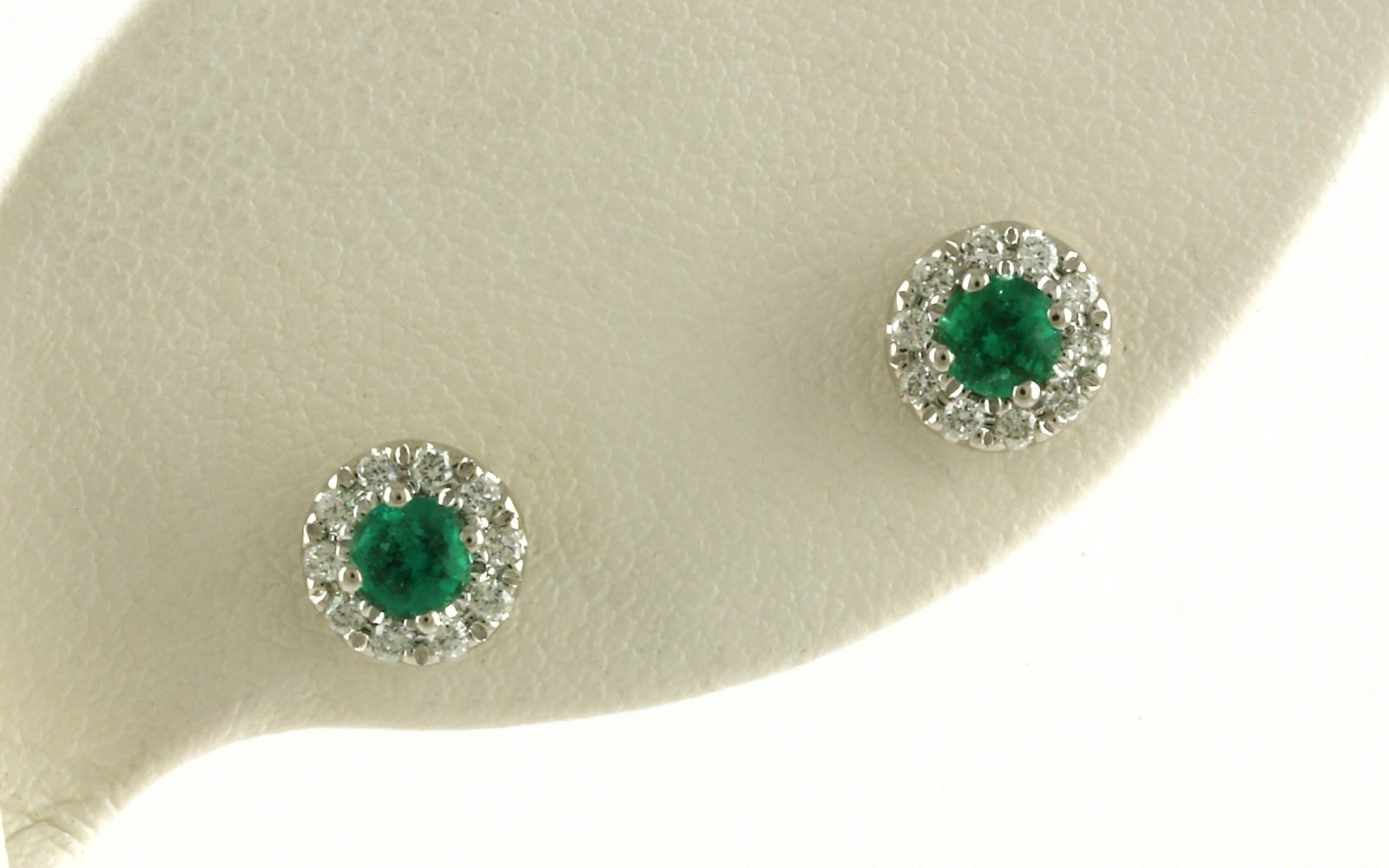 Emerald and Diamond Halo Earrings in White Gold (0.53cts TWT) stand