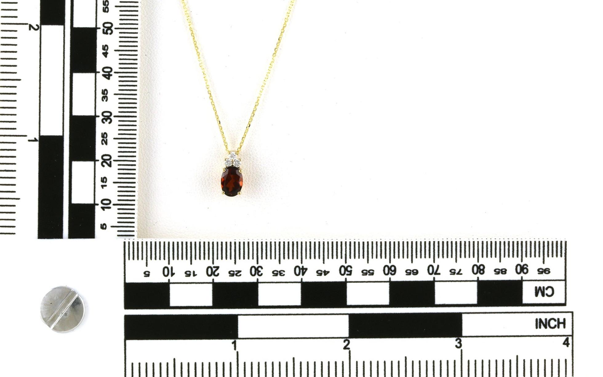Accented Oval Slide Garnet and Diamond Necklace in Yellow Gold (1.10cts TWT) scale
