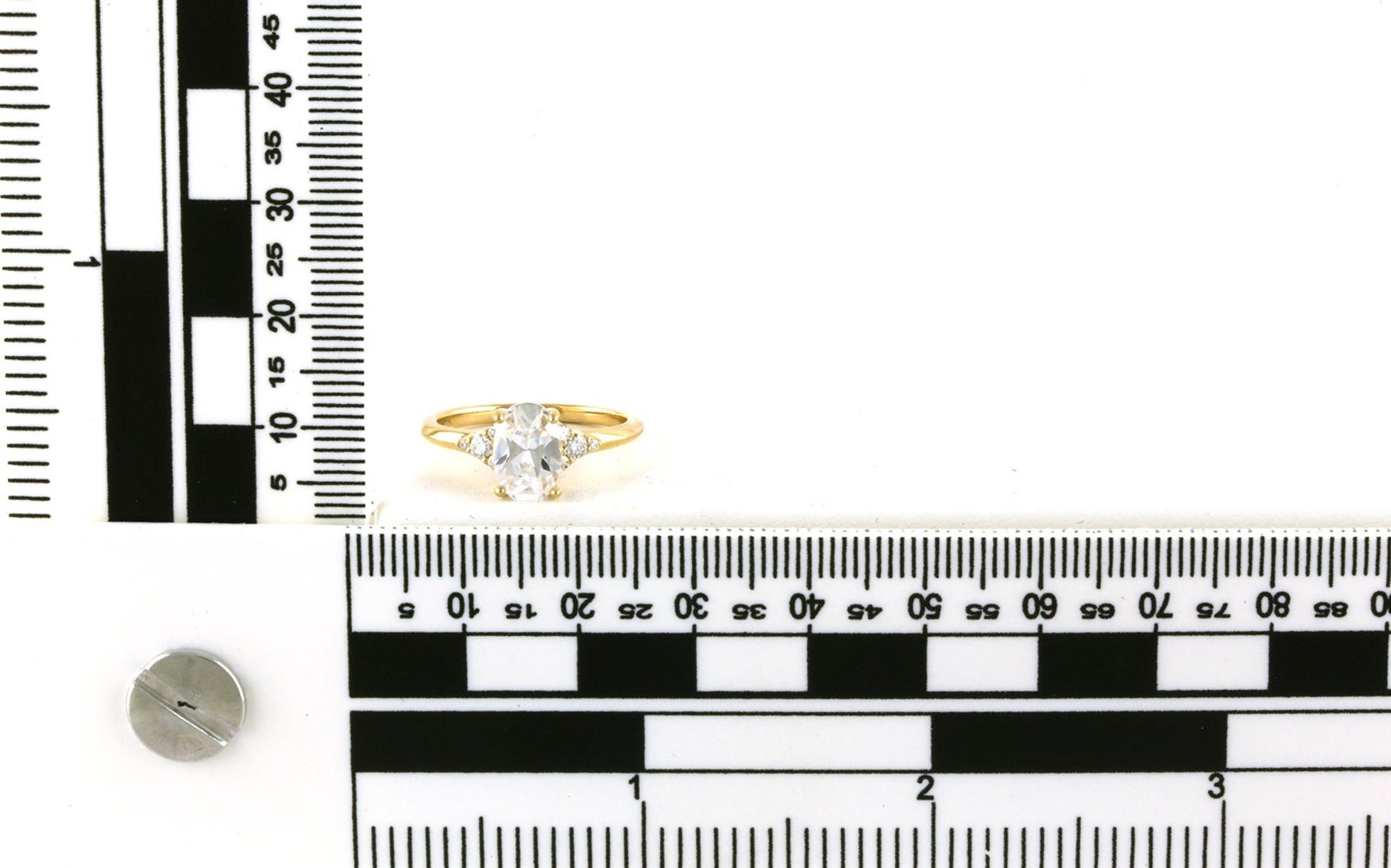 Oval-cut Cubic Zirconia and Diamond Cluster Engagement Ring in Yellow Gold (1.70cts TWT) scale