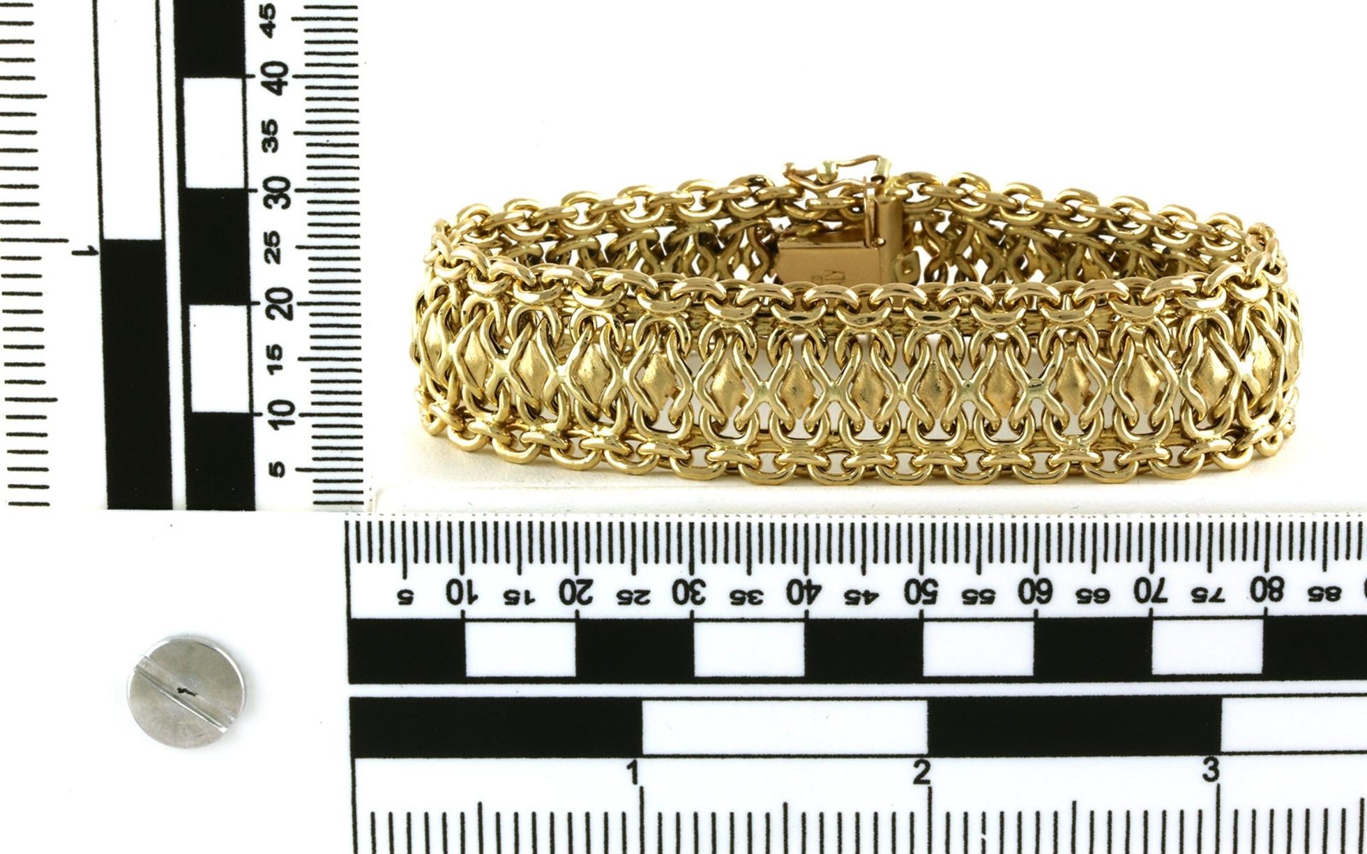 Estate Piece: Wide Fancy Link Bracelet in Yellow Gold scale