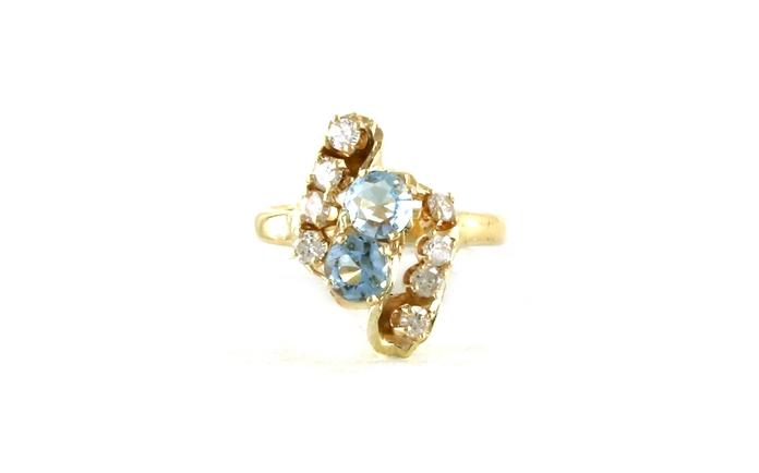 content/products/Estate Piece: Aquamarine and Diamond Swoop Cluster Ring in Yellow Gold (0.65cts TWT)