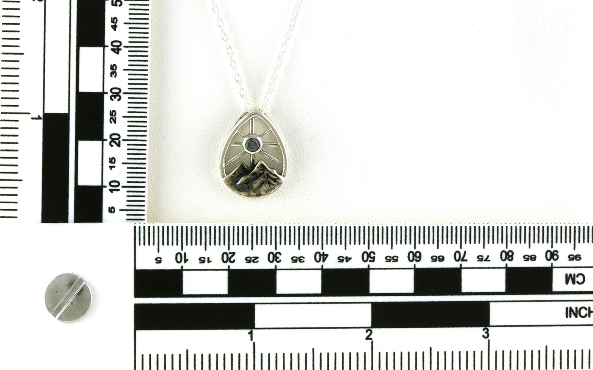 Montana Sapphire Pear-Shape Mountain Scape with Sun Necklace in Sterling Silver (0.12ct) scale