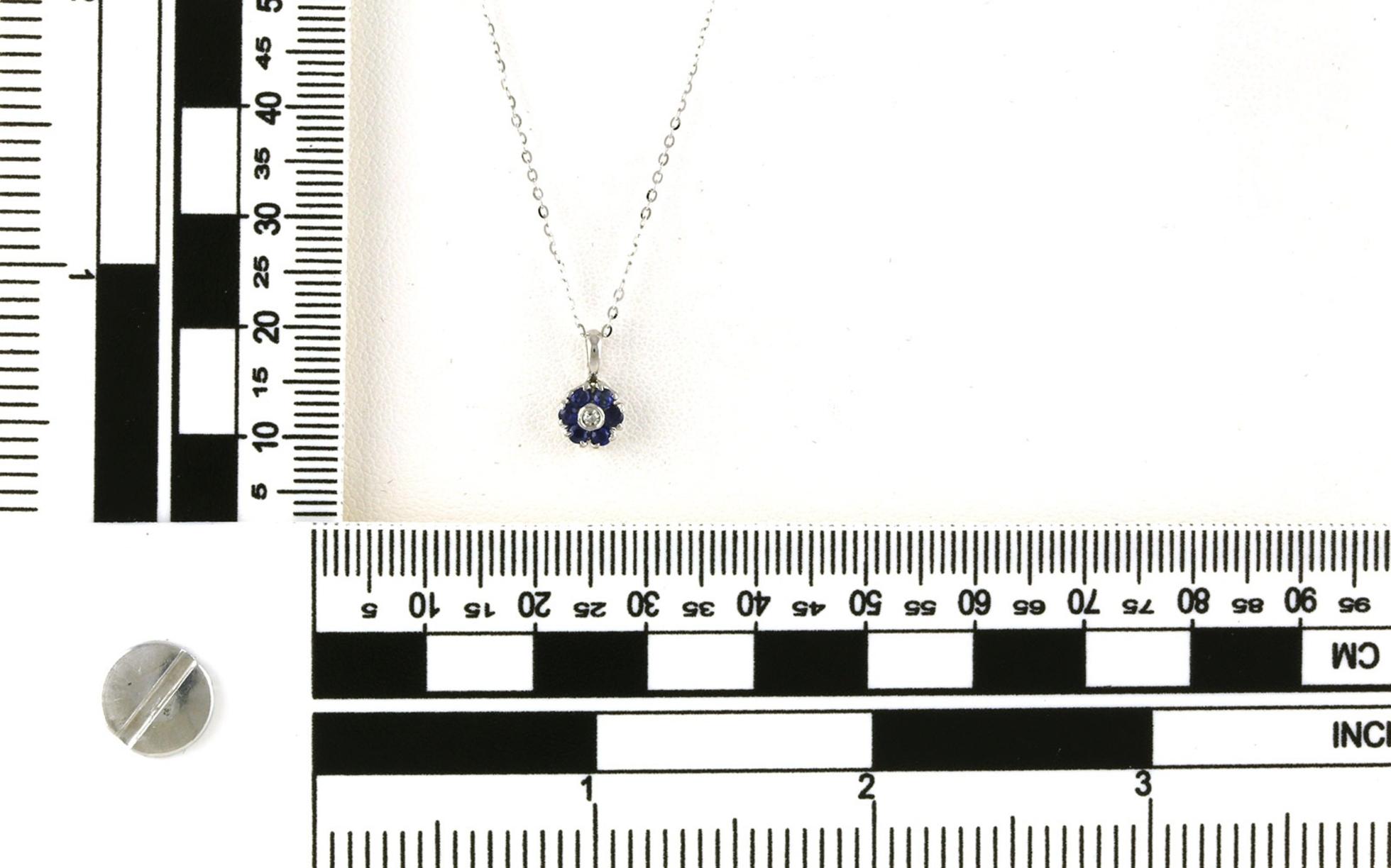 Estate Piece: Sapphire and Diamond 7-Stone Flower Cluster Necklace in White Gold (0.15cts TWT) scale