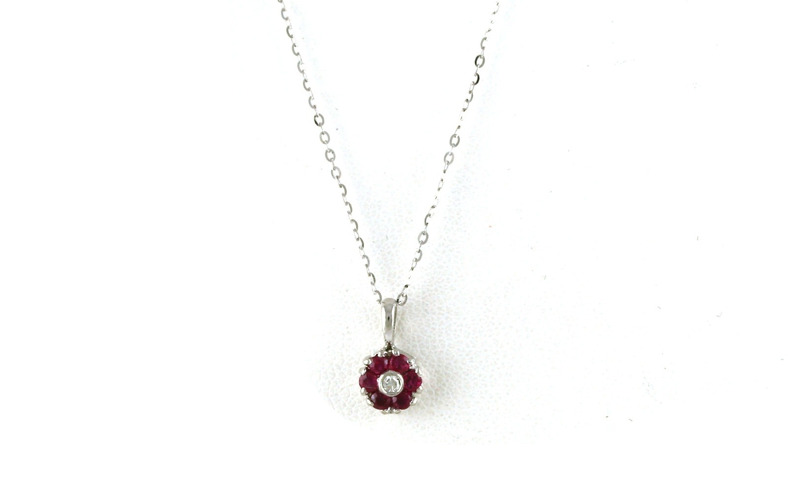 Estate Piece: Ruby and Diamond 7-stone Flower Cluster Necklace in White Gold (0.15cts TWT)