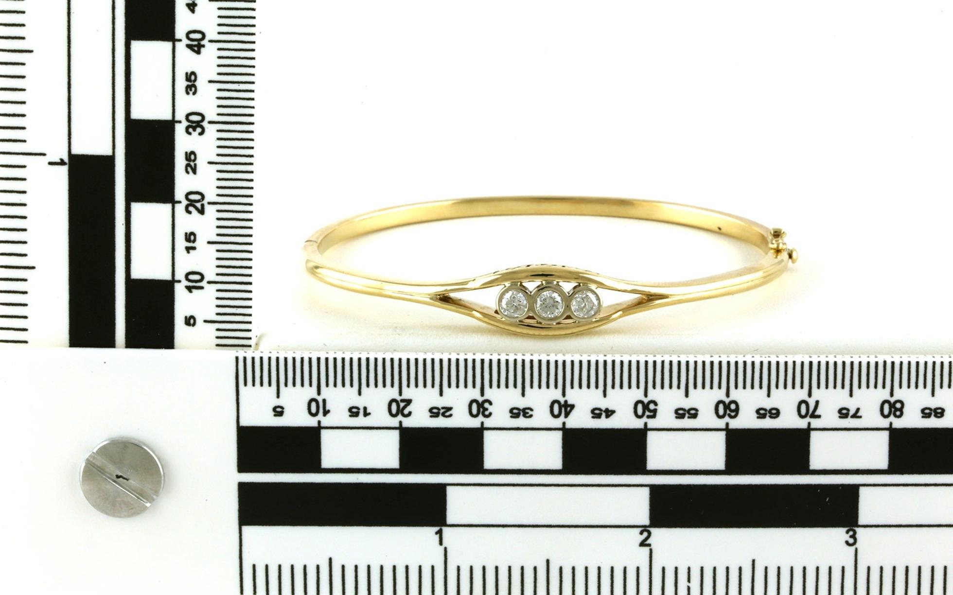 Estate Piece: Diamond 3-stone Hinged Bangle Bracelet in Yellow Gold (0.45cts TWT) scale
