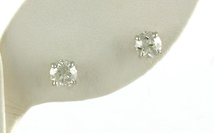 content/products/Diamond Scroll Solitaire Stud Earrings in White Gold (0.66cts TWT)