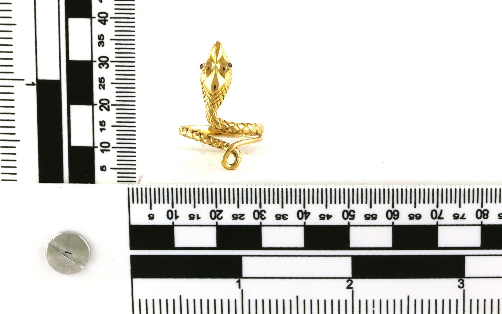 Estate Piece: Snake Fashion Ring with Ruby Eyes in Yellow Gold scale