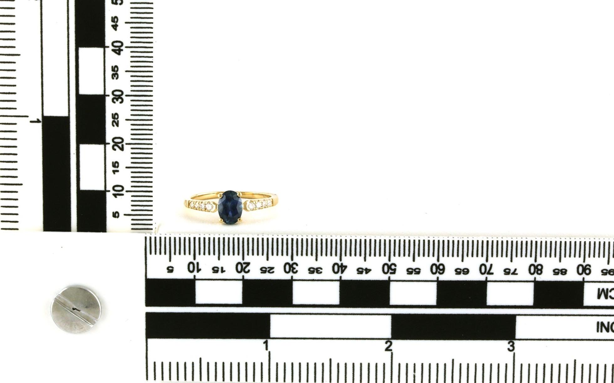 Oval-cut Montana Sapphire and Pave Diamond Ring in Yellow Gold (1.22cts TWT) scale