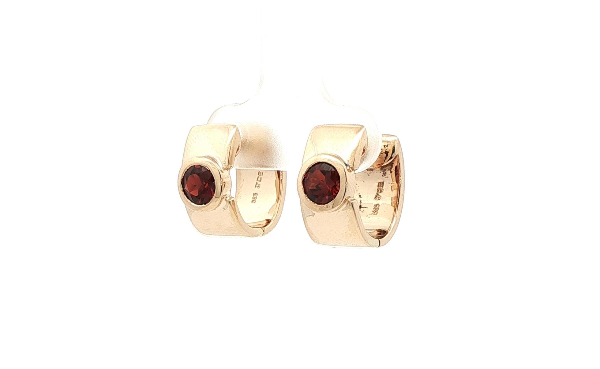 Estate Piece: Wide Garnet Hoop Earrings in Yellow Gold side