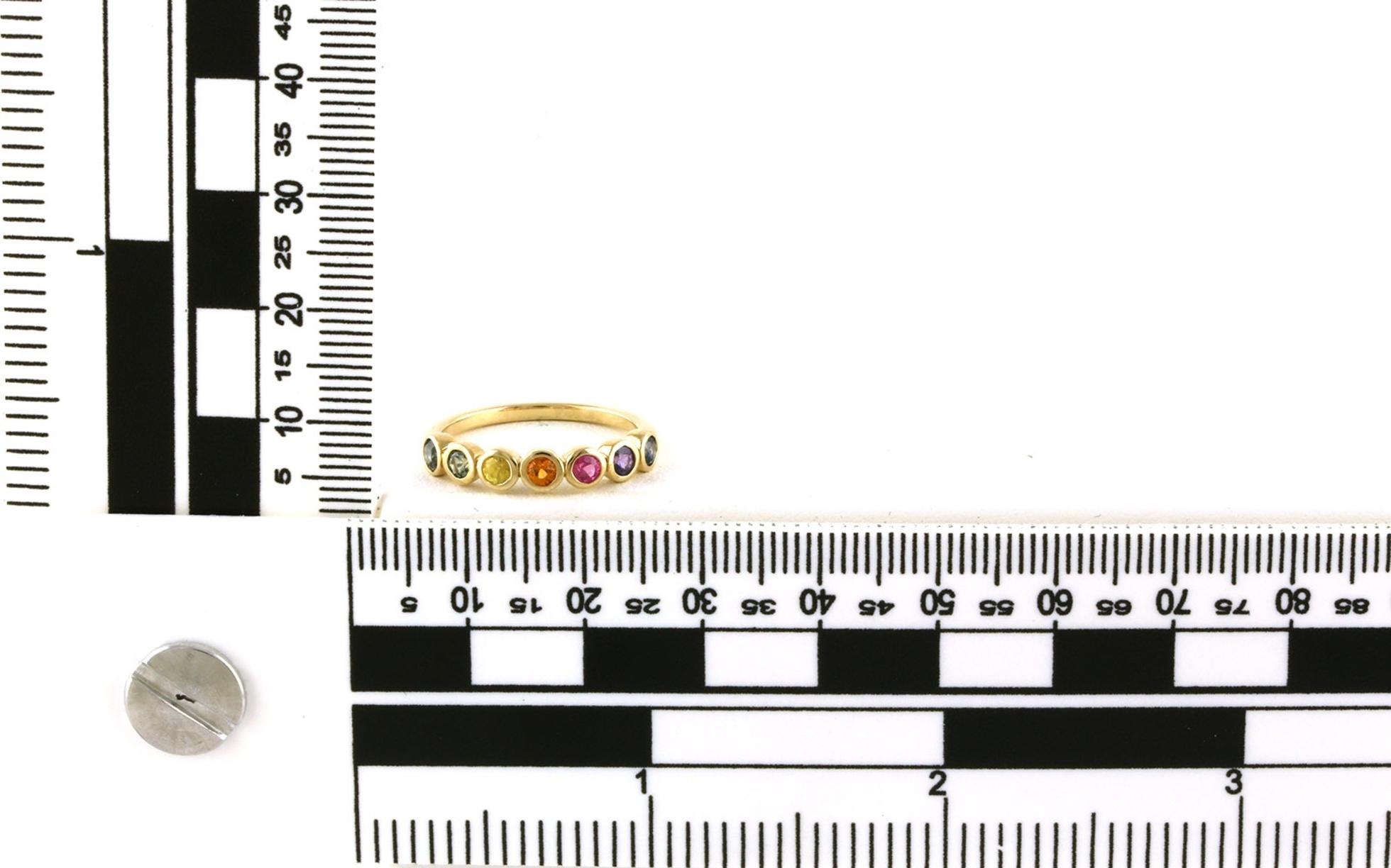7-Stone Bezel-Set Rainbow Montana Sapphire Ring in Yellow Gold (0.78cts TWT) scale