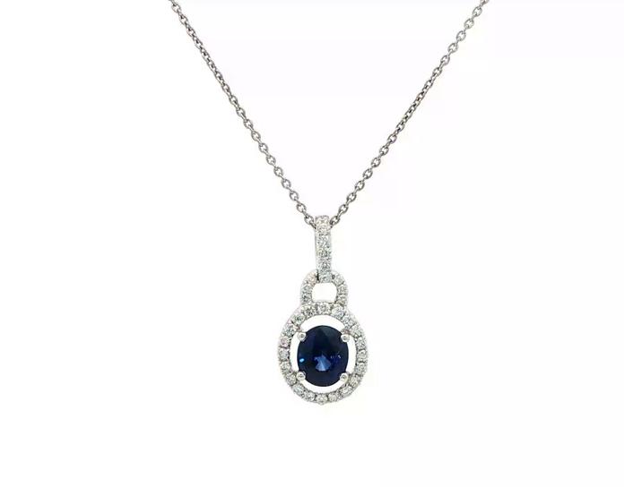 content/products/Estate Piece: Oval Halo Drop Sapphire and Diamond Necklace in White Gold (0.90cts TWT)