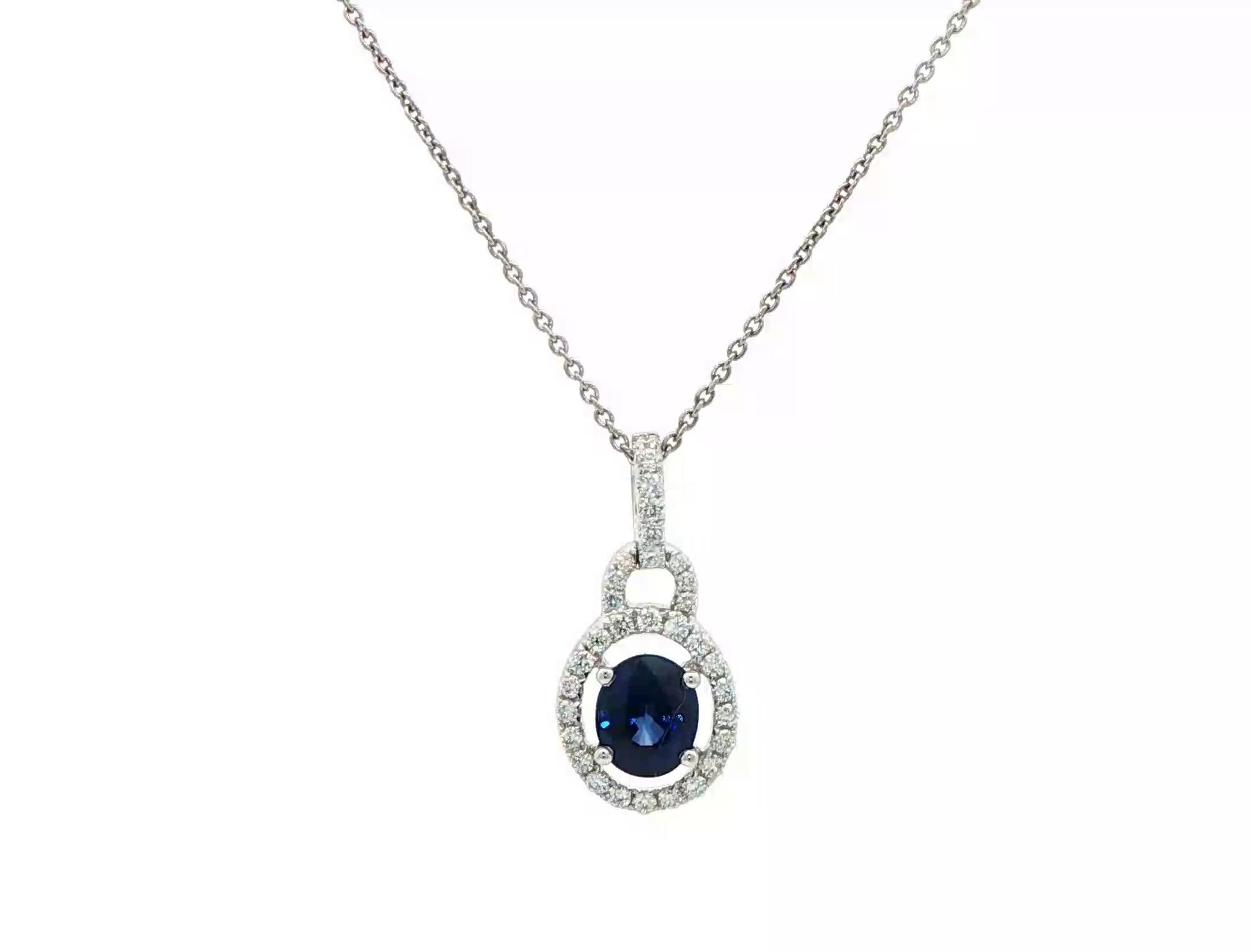 Estate Piece: Oval Halo Drop Sapphire and Diamond Necklace in White Gold (0.90cts TWT)