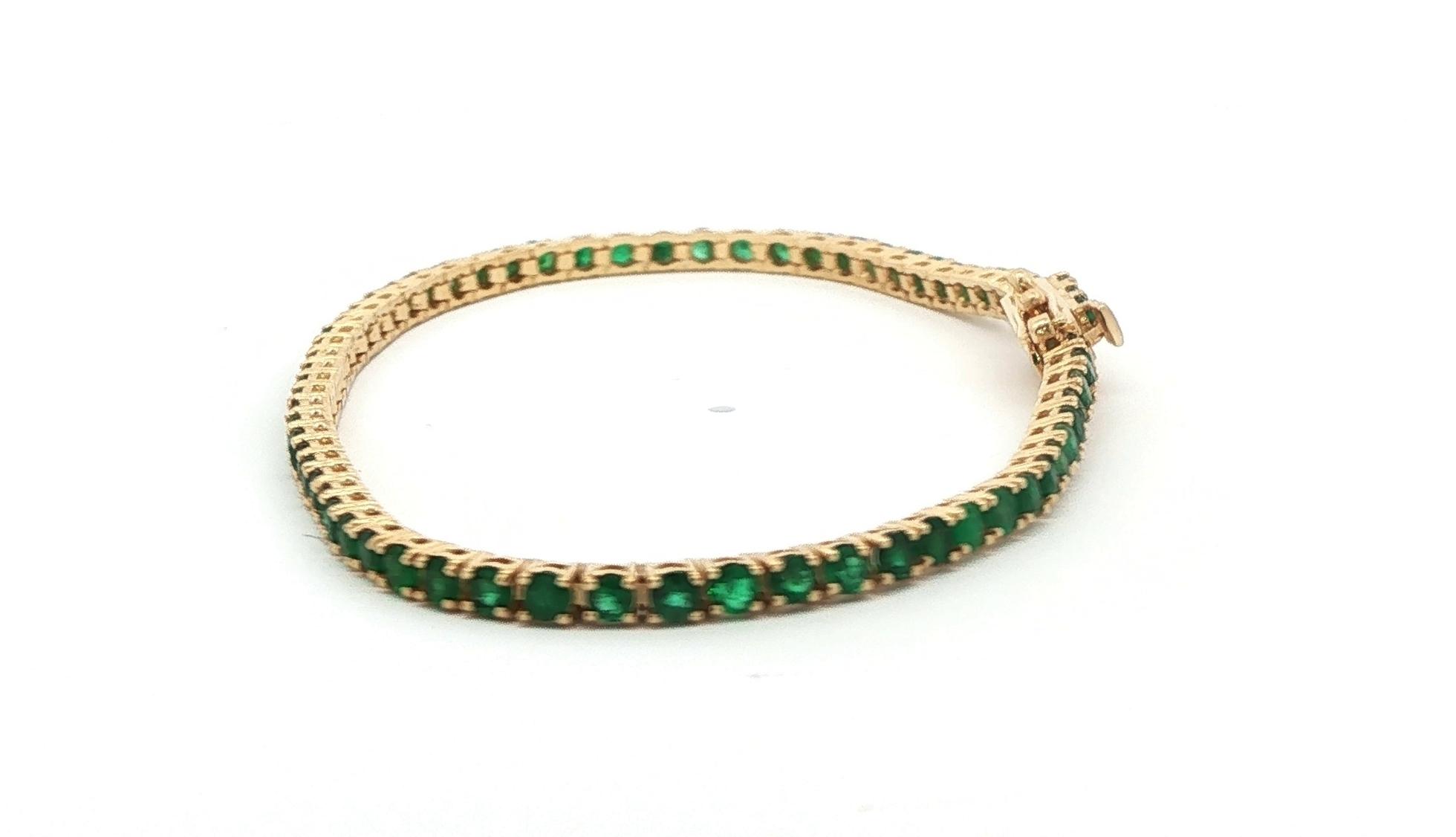 4-Prong Line Emerald Tennis Bracelet in Yellow Gold (3.80cts TWT) side