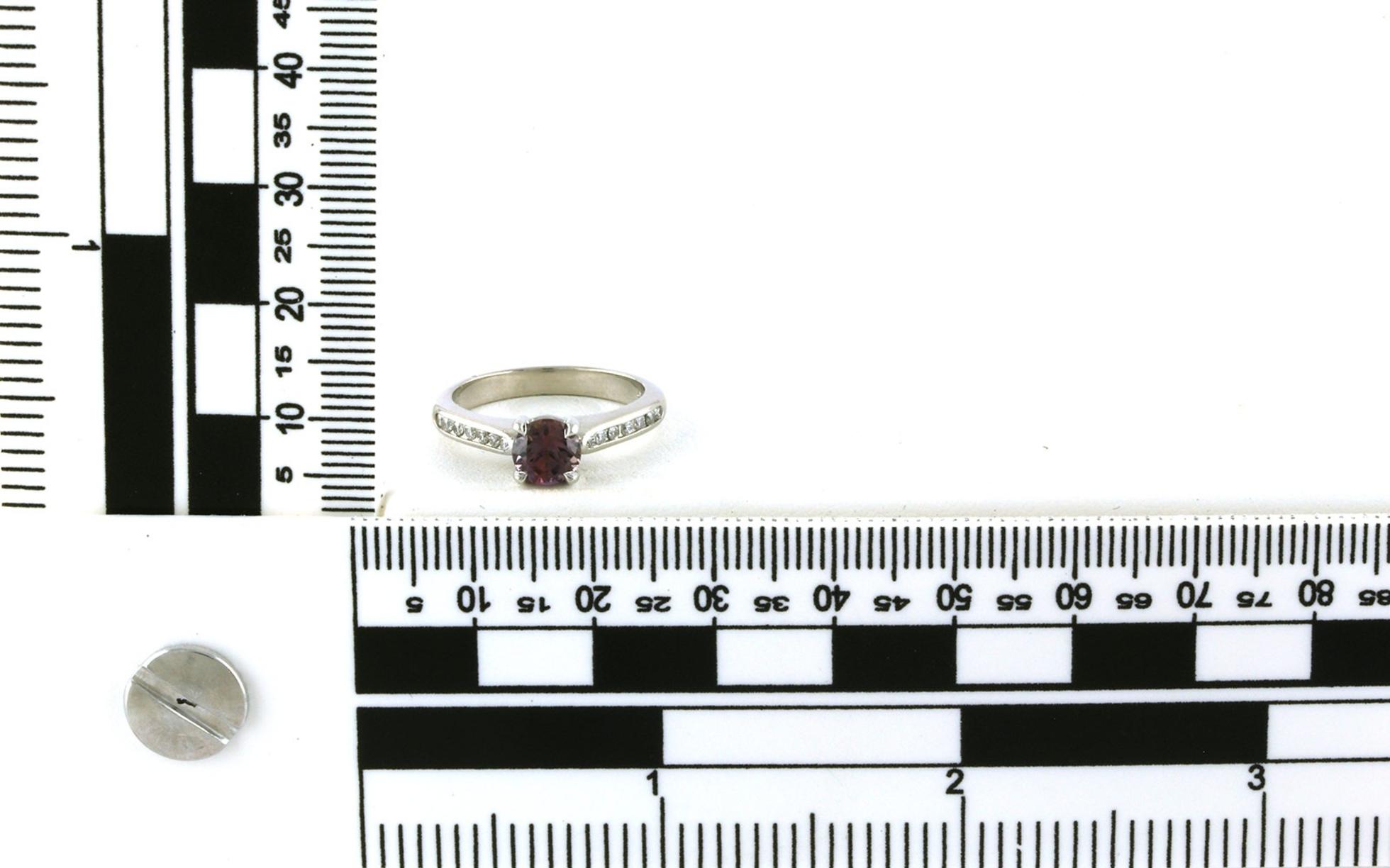 Estate Piece: 4-Prong Montana Sapphire with Channel-Set Diamonds Ring in Platinum (1.26cts TWT) scale