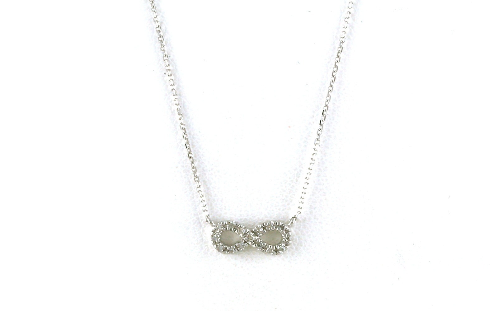 Estate Piece: Diamond Pave Infinity Necklace in White Gold (0.05cts TWT)