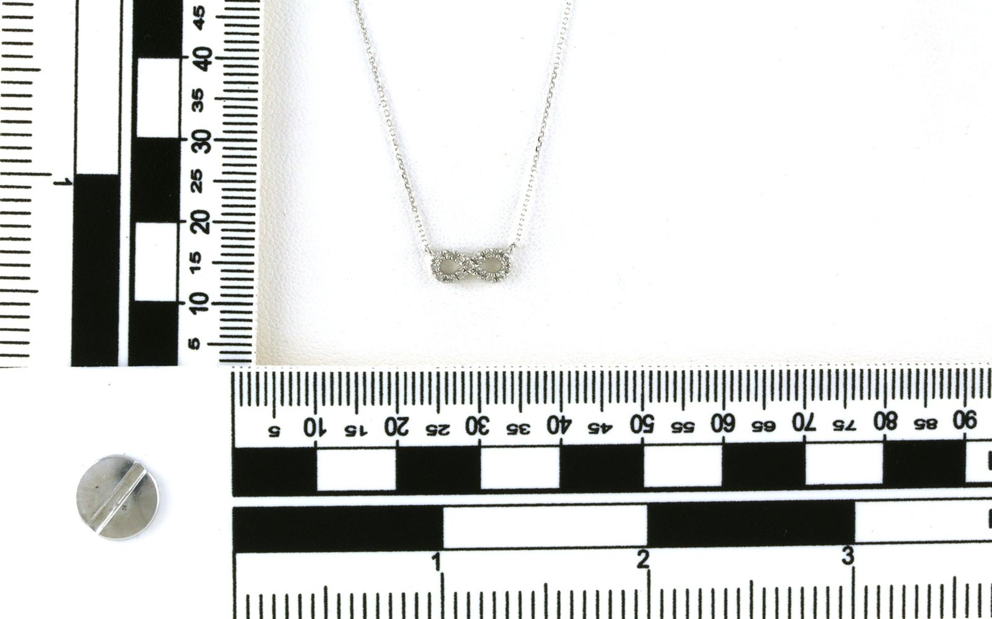 Estate Piece: Diamond Pave Infinity Necklace in White Gold (0.05cts TWT) scale