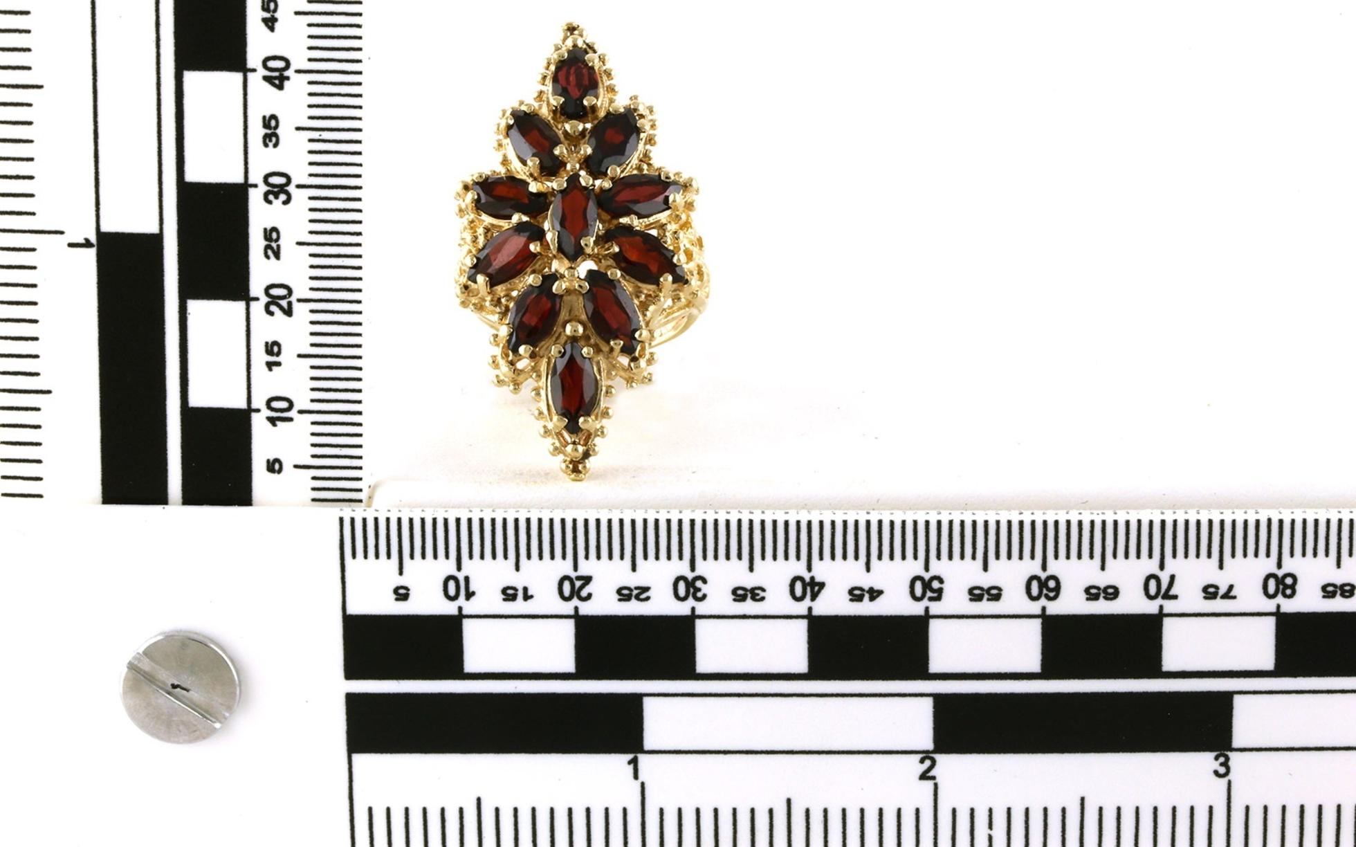 Estate Piece: Garnet Cluster Cocktail Ring in Yellow Gold (7.00cts TWT) scale