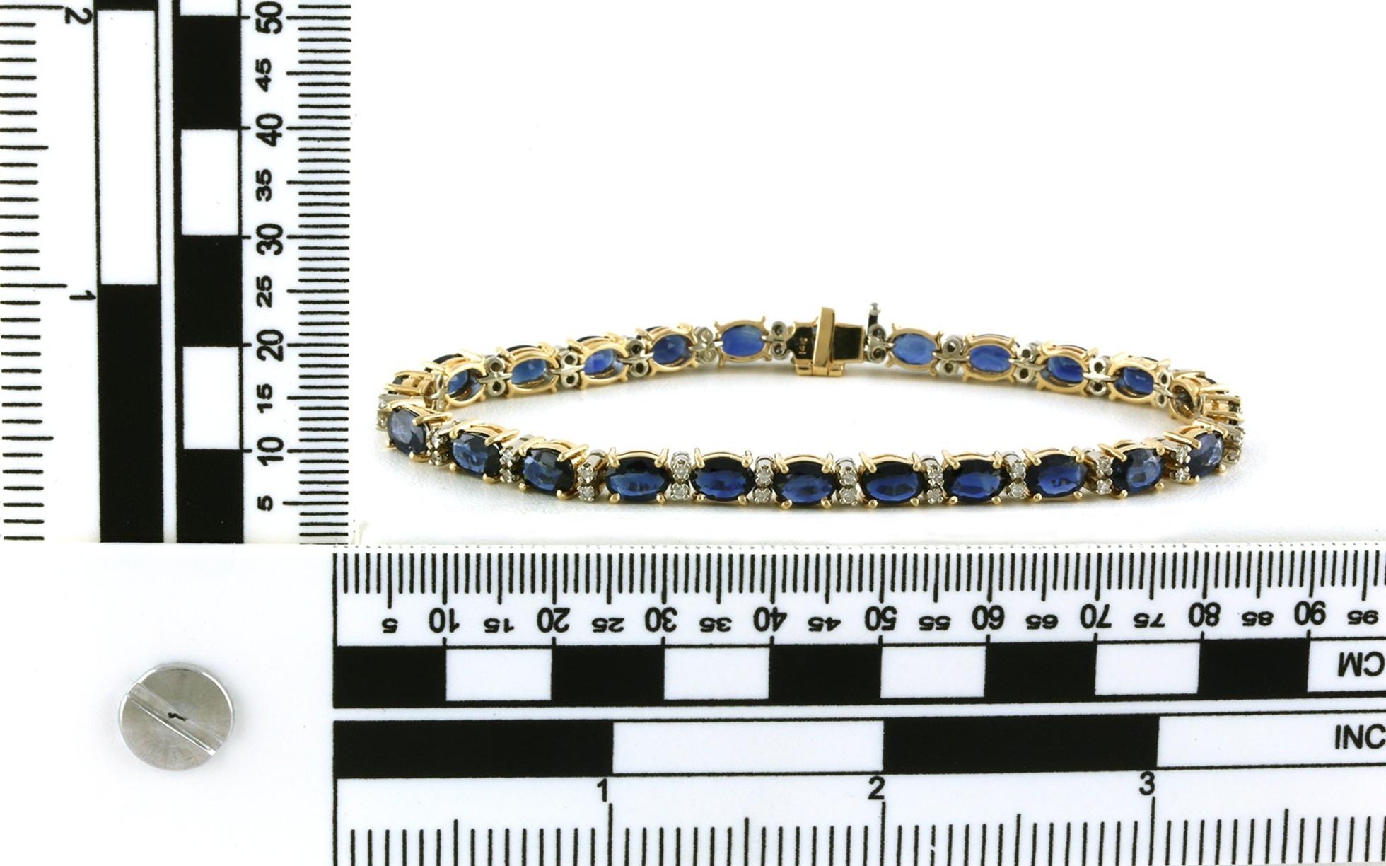 Estate Piece: Sapphire and Diamond Line "Tennis" Bracelet in Yellow Gold(10.50cts TWT) scale