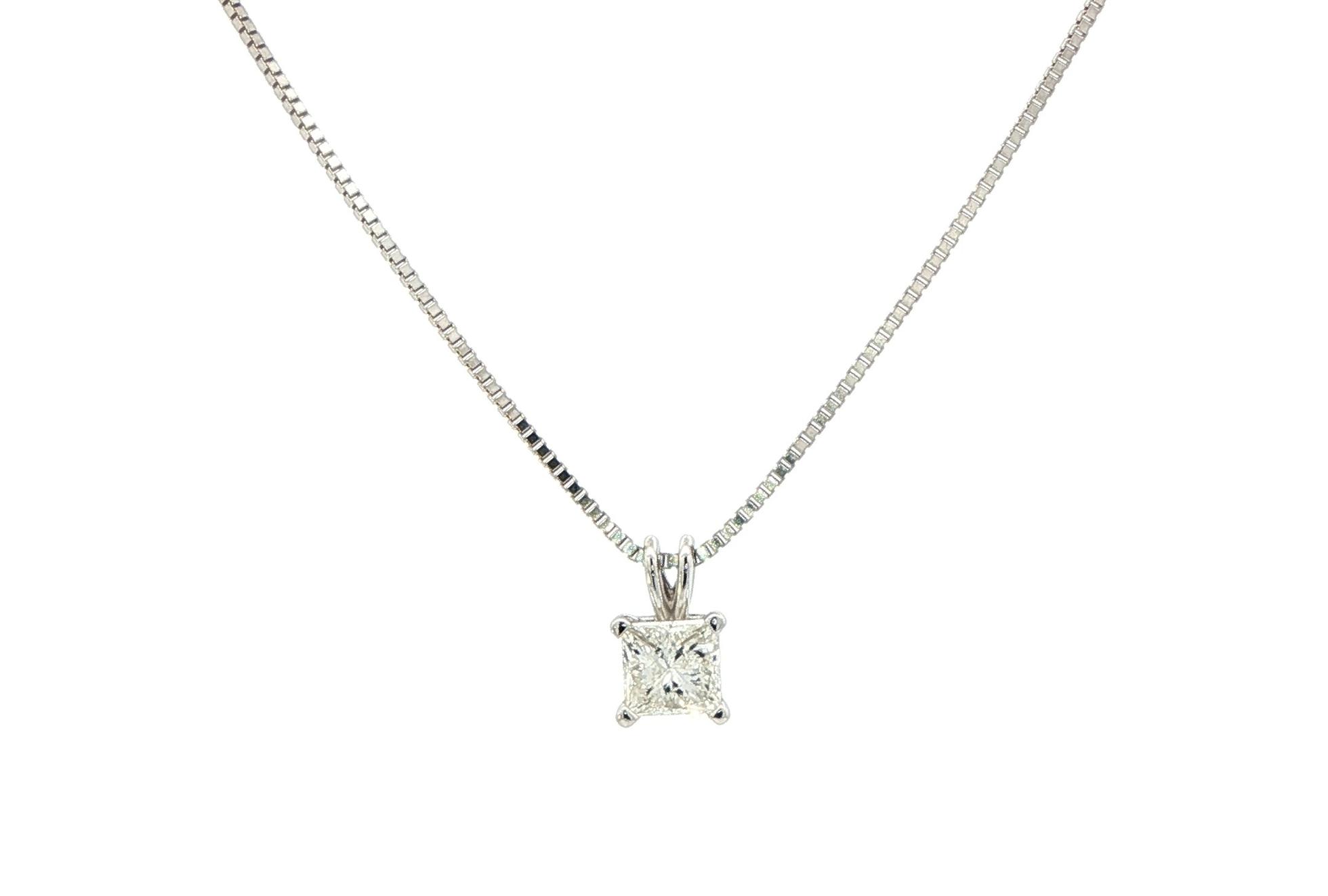 4-Prong Rabbit Ear Diamond Solitaire Necklace in White Gold (0.79ct)