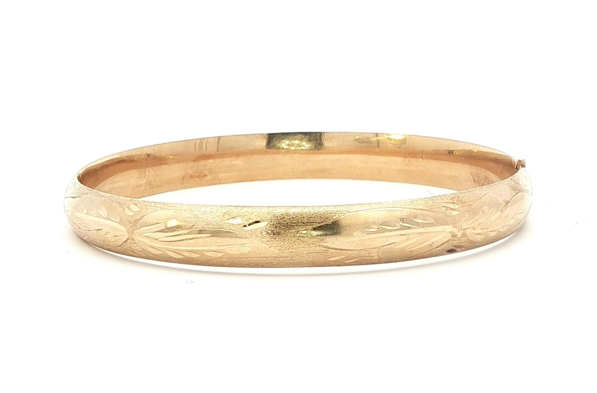 Estate Piece: Floral Hinged Bangle Bracelet in Yellow Gold