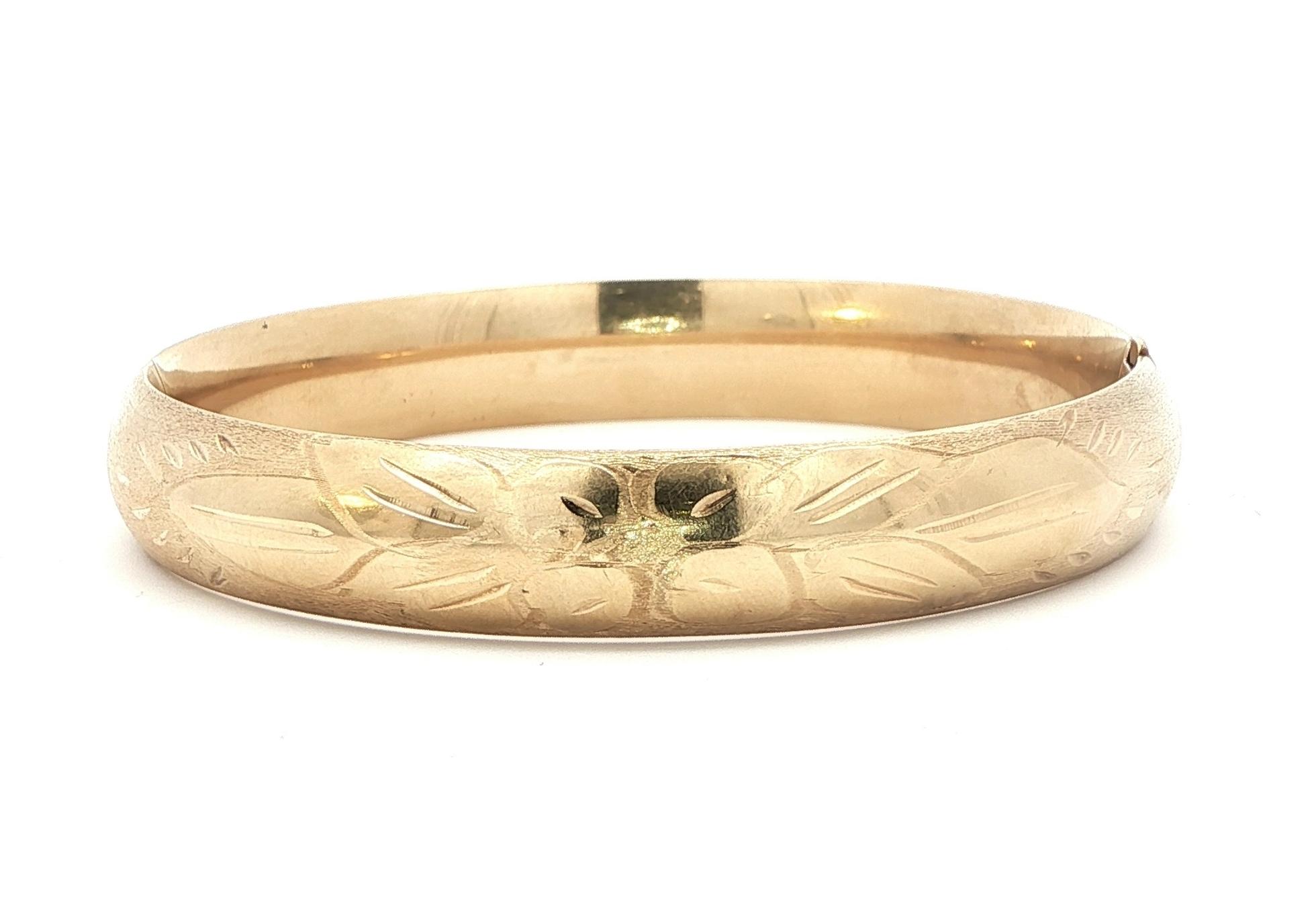 Estate Piece: Floral Hinged Bangle Bracelet in Yellow Gold