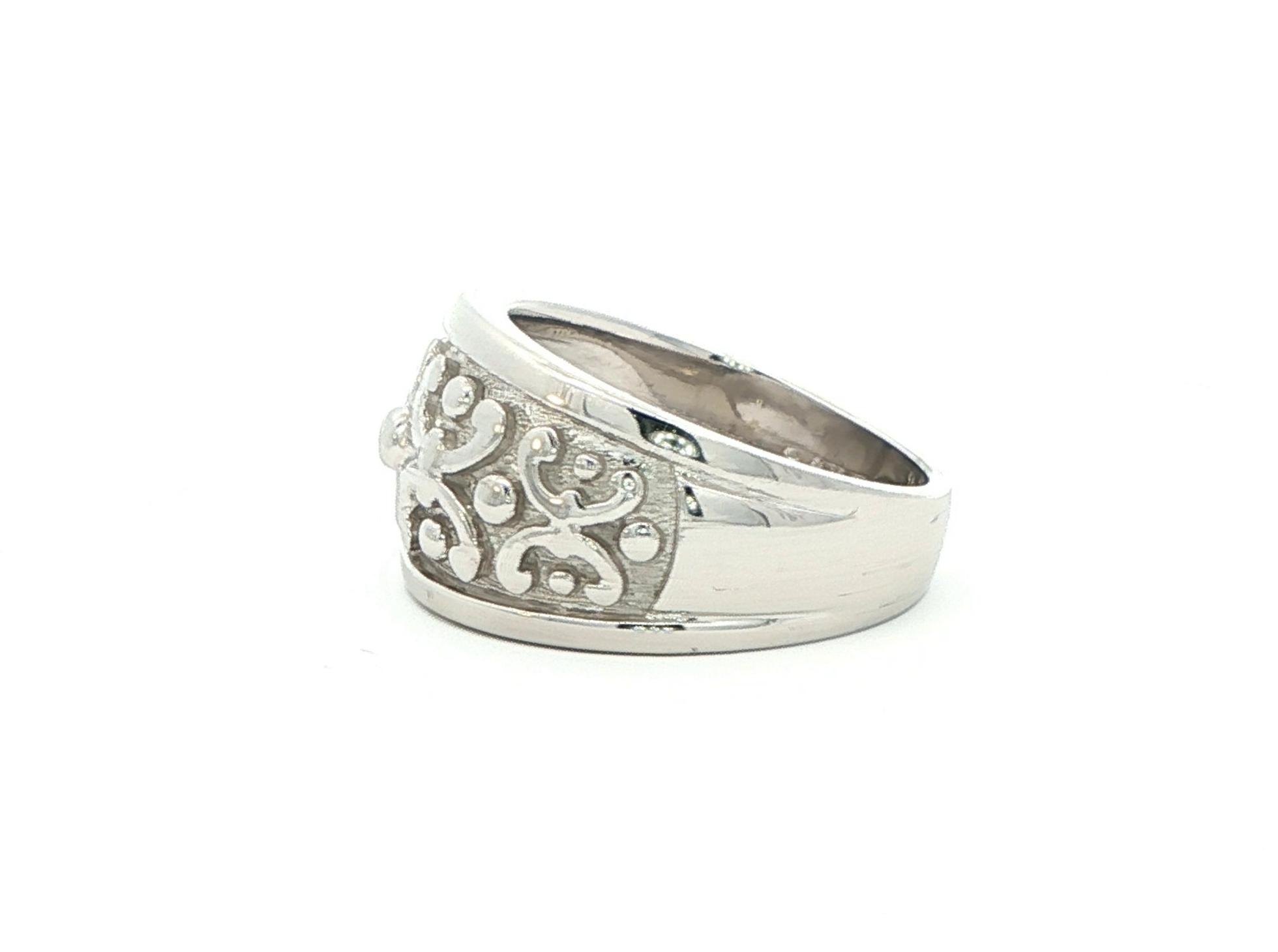 Estate Piece: Wide Filigree Style Ring in White Gold side