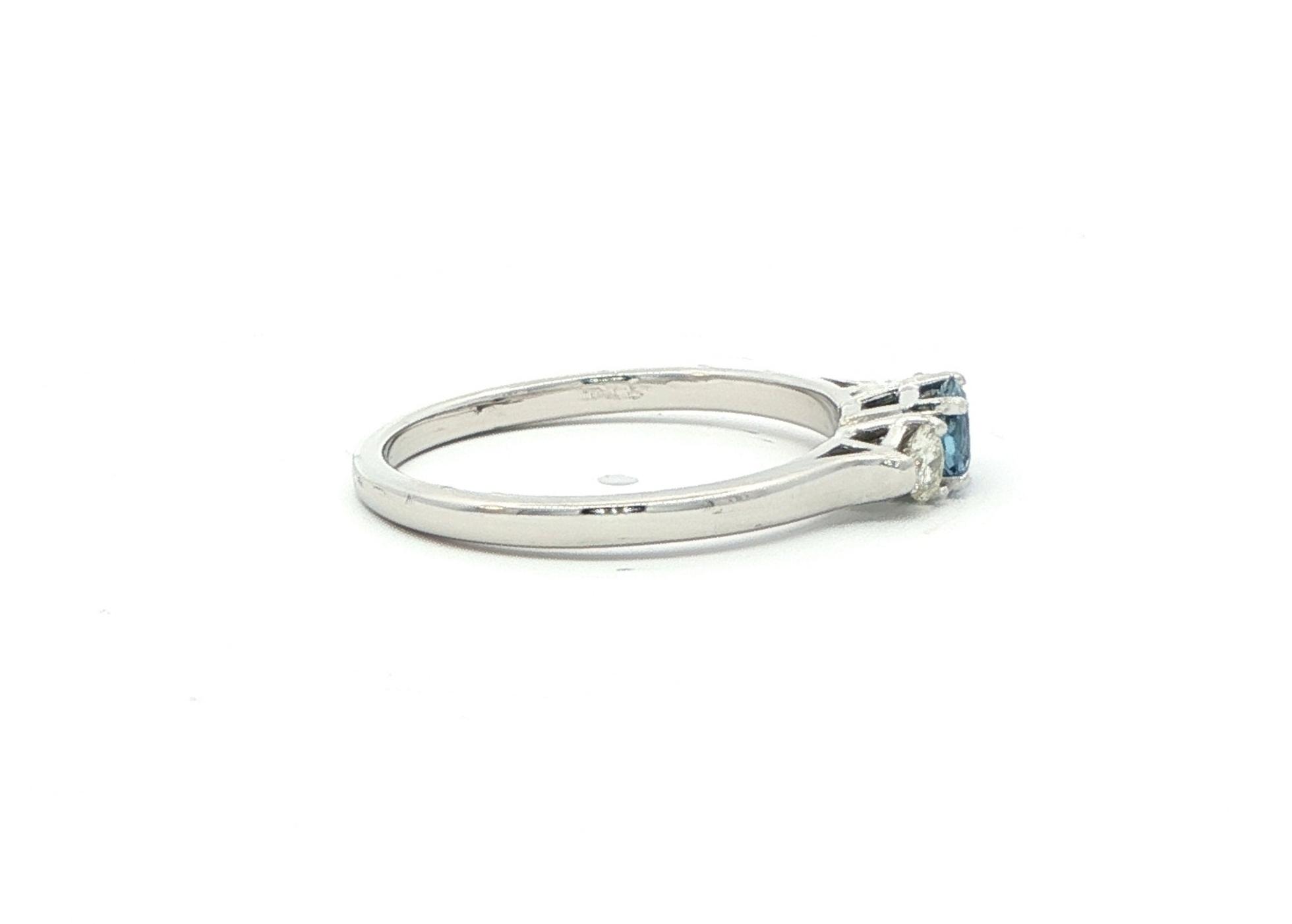 Estate Piece: 3-Stone Montana Sapphire and Diamond Ring in White Gold (0.45cts TWT) side