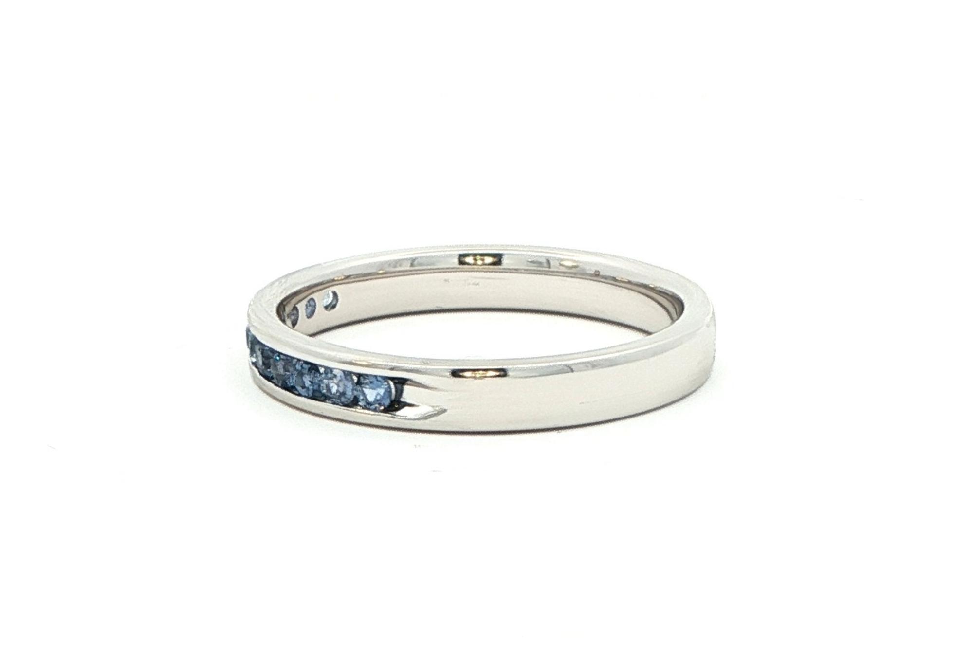 Estate Piece: 11-Stone Montana Yogo Sapphire Channel Band in White Gold (0.30cts TWT) side