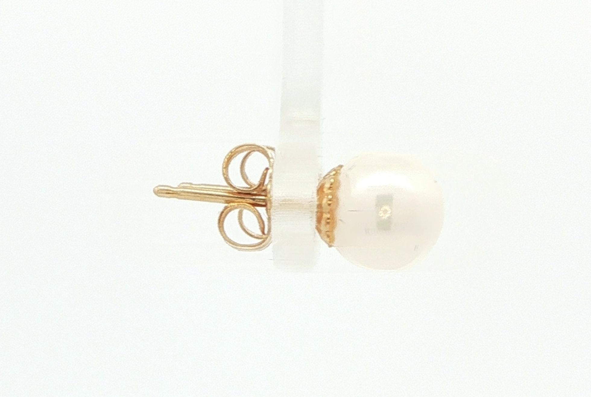 Estate Piece: Akoya Pearl Stud Earrings in Yellow Gold side