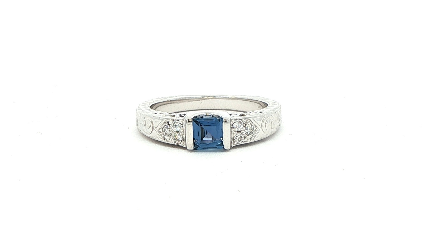 Estate Piece: Engraved Bar-Set Montana Yogo Sapphire and Diamond Cluster Ring in White Gold (0.64cts TWT)