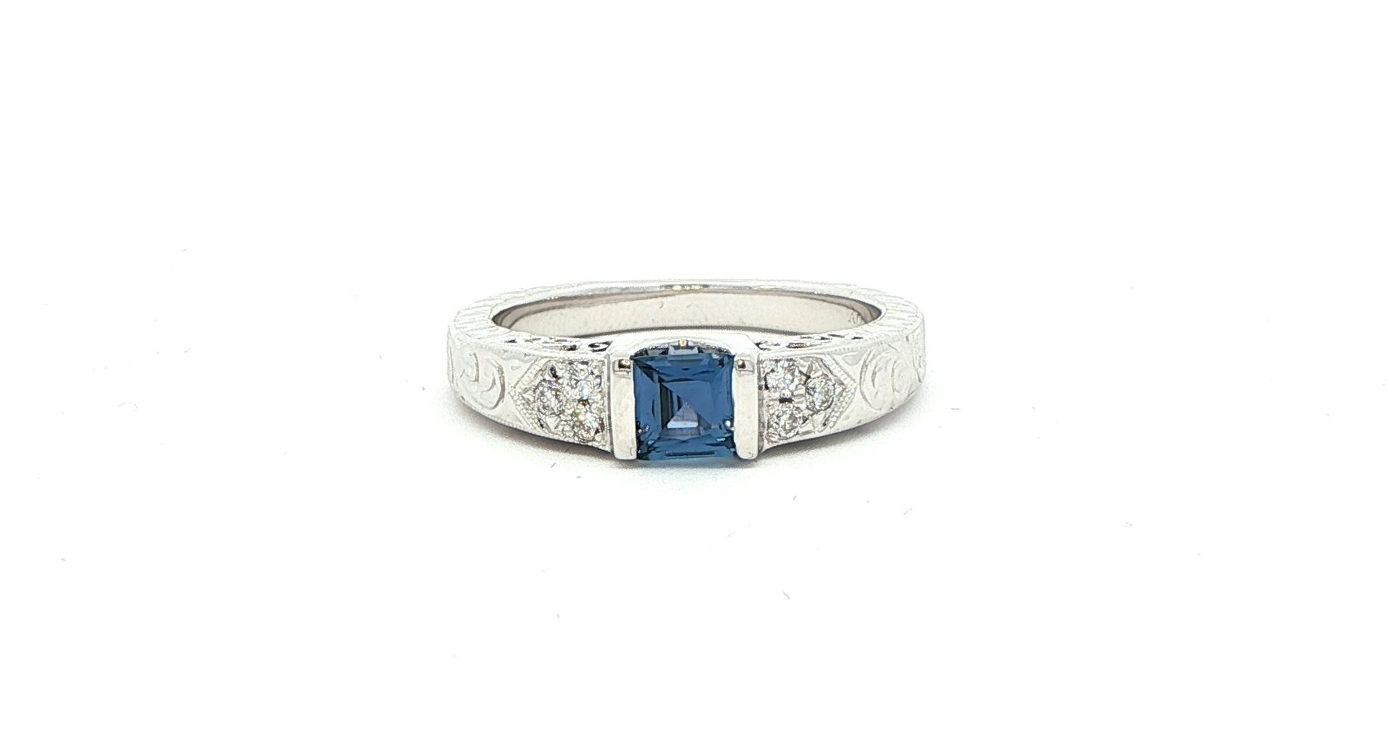 Estate Piece: Engraved Bar-Set Montana Yogo Sapphire and Diamond Cluster Ring in White Gold (0.64cts TWT)
