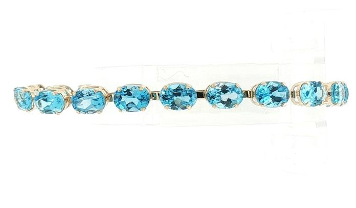 content/products/Estate Piece: 4-Prong Blue Topaz "Tennis" Bracelet in Yellow Gold (17.00cts TWT)
