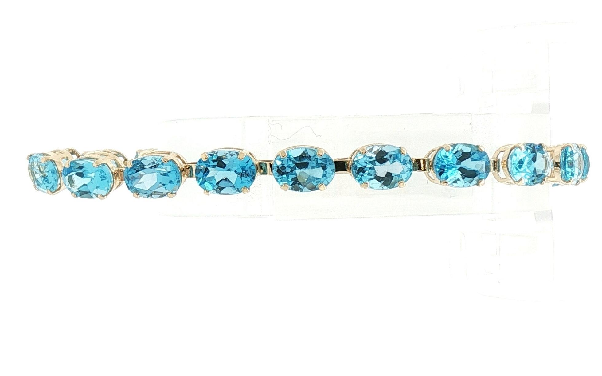 Estate Piece: 4-Prong Blue Topaz "Tennis" Bracelet in Yellow Gold (17.00cts TWT)