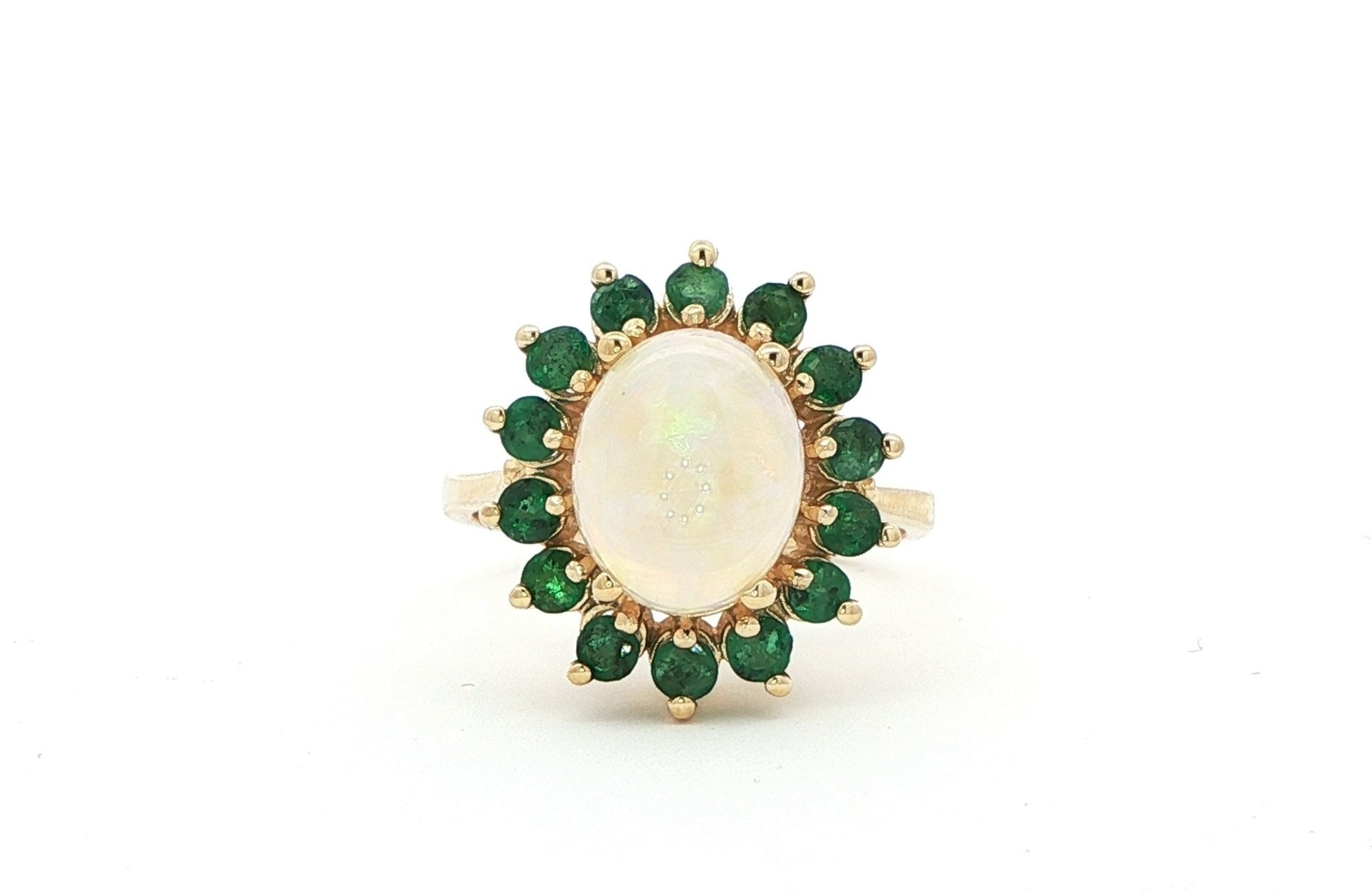 Estate Piece: Oval Opal with Emerald Halo Ring in Yellow Gold (3.75cts TWT)