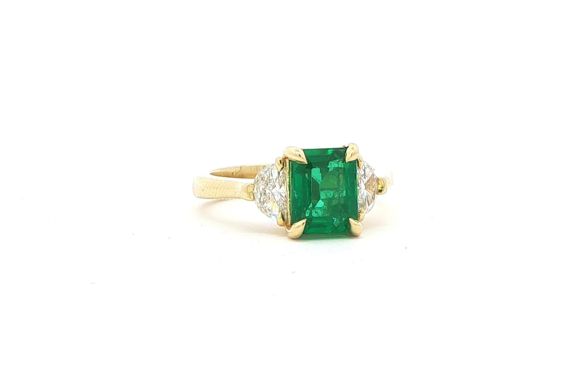 3-Stone Emerald-cut Emerald and Half Moon-cut Diamond Ring in Yellow Gold (2.69cts TWT) angled